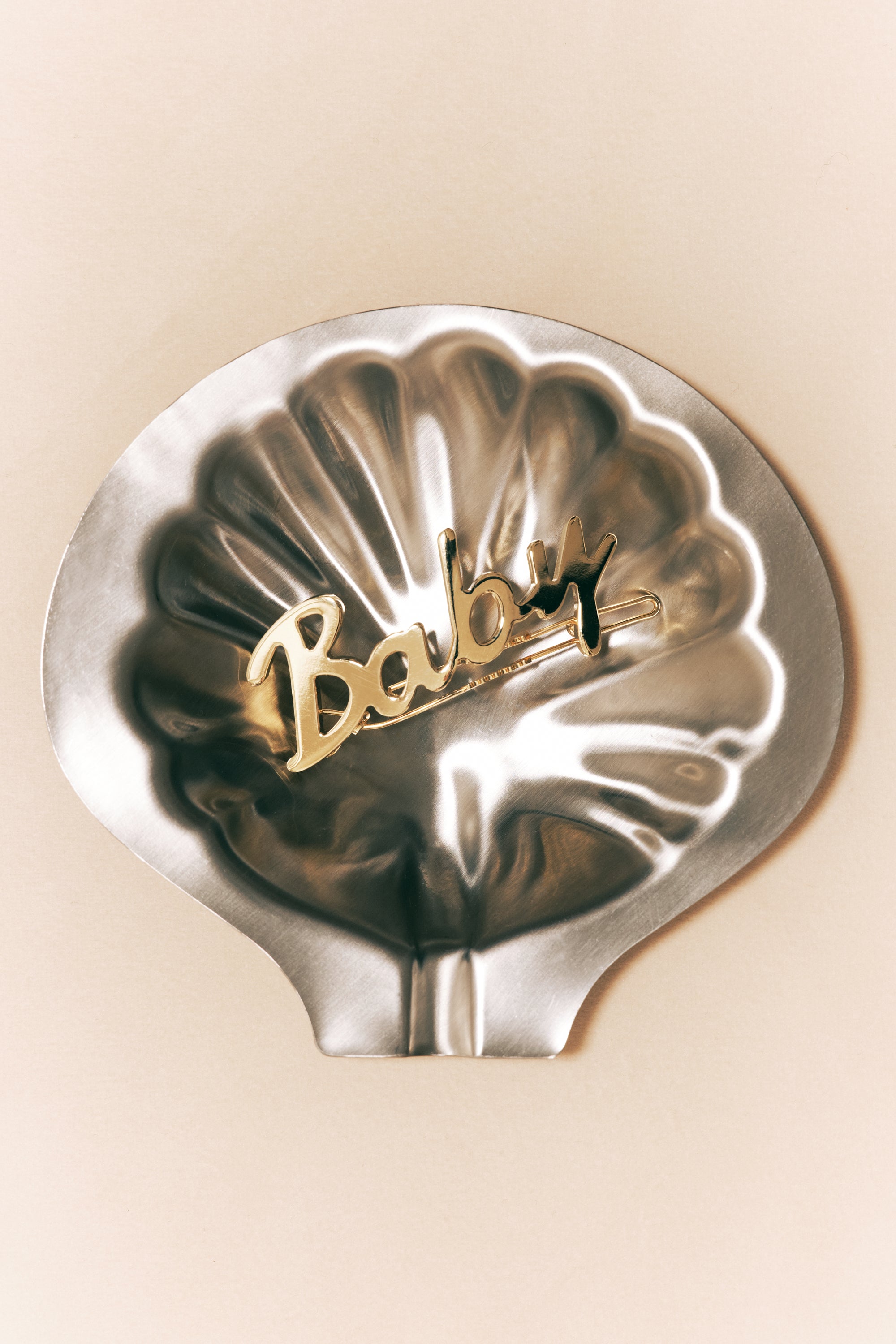 Barrette Baby doré