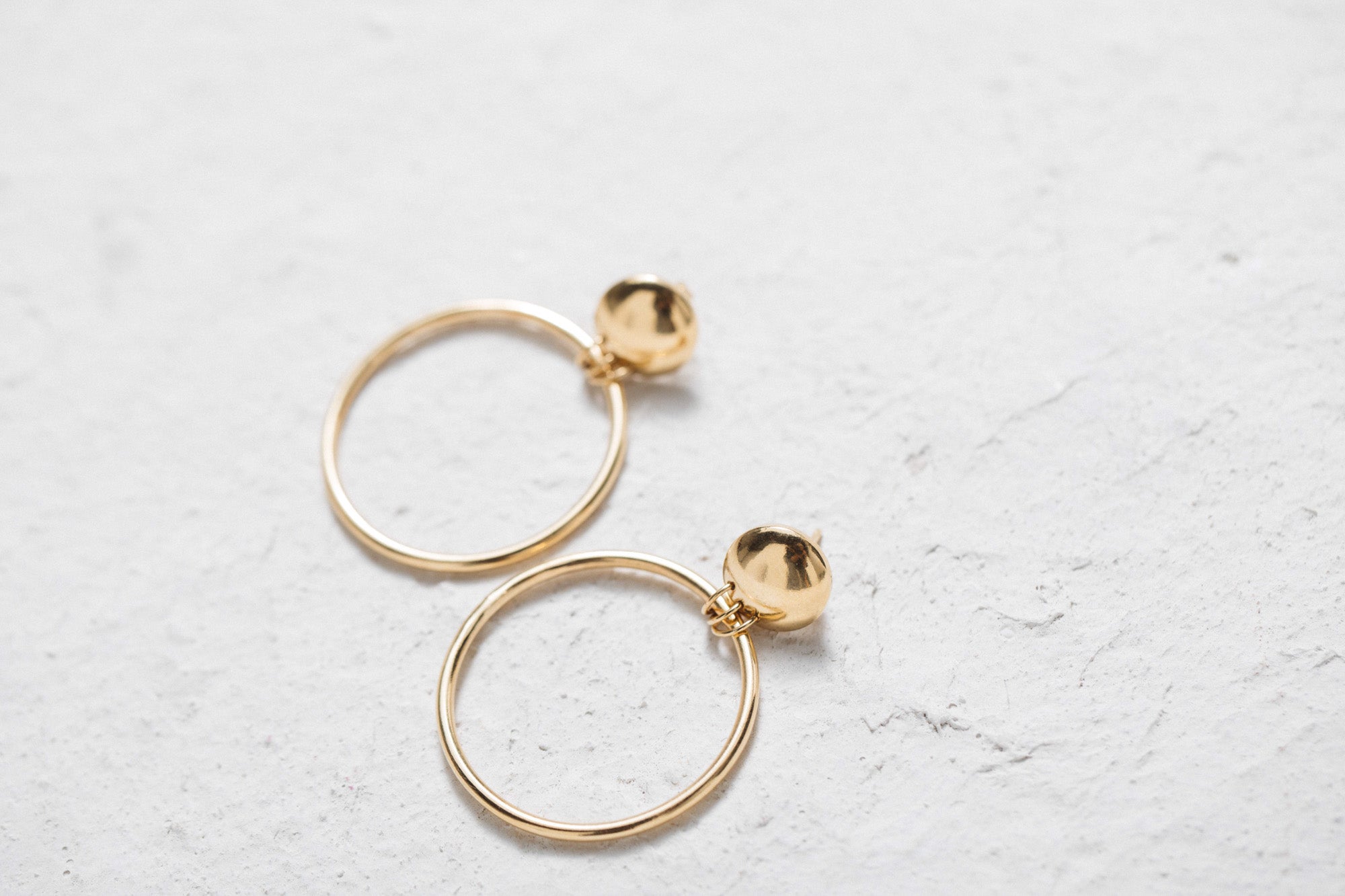 Boucles d'oreille Tila doré